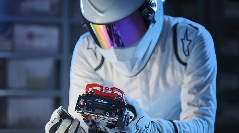 The Stig drives LEGO Technic Top Gear Rally Car around the LEGO House